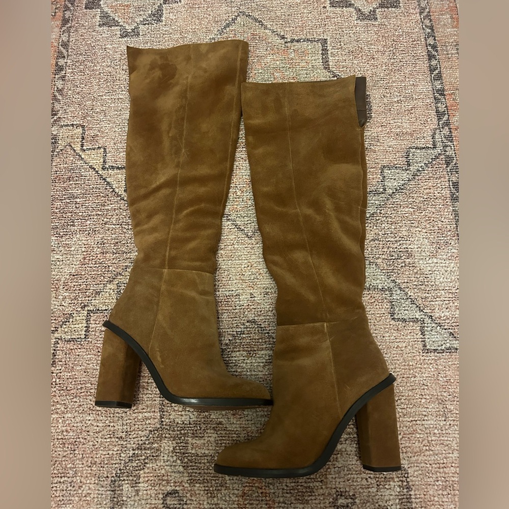 brown heeled boots fairly worn